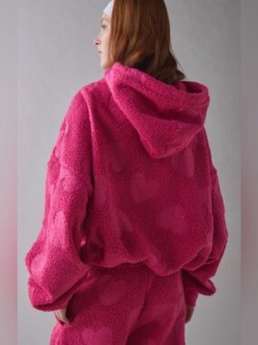 Out from under Cozy Pink Sherpa Hoodie with Heart Texture